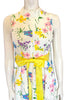 White and multicolor floral maxi dress with yellow belt.