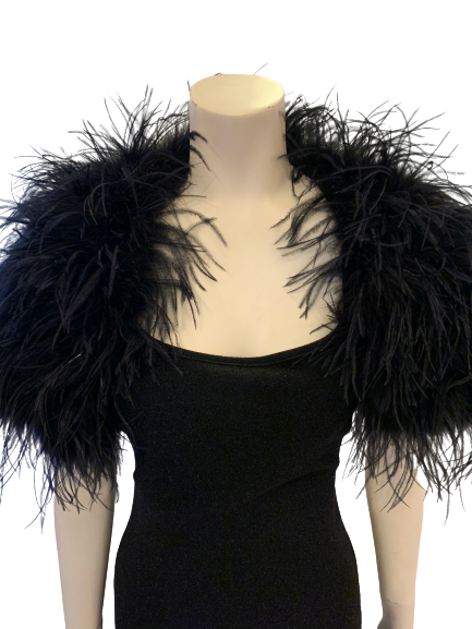 Shoulder shrug  in black feathers lays across shoulders  Also available in white.