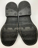Rubber soles of 1990s black penny loafers