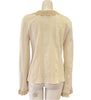 cotton gauze long sleeve blouse on a mannequin