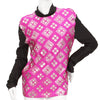 Fuschia shirt with black long-sleeves, black mock-neck, and a silver, graphic print with mirrored embellishments. 