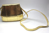 Front view of metallic gold snake Prada bag and included, detachable gold snake shoulder strap.