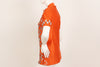 Orange, short-sleeve, mock-neck shirt with a silver, graphic print with mirrored embellishments. 