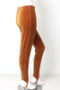 Full length side view of mannequin wearing 1980s gold/orange velvet stirrups