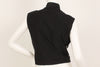 Black, sleeveless, mock-neck top with loop at back of neck.
