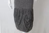 Close up of draping around the hem of the Missoni Grey Boucle Knit Tank Dress