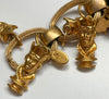 gold chain belt with king head charms