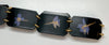 black plastic chain belt with purple flowers pressed inside