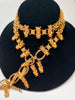 gold chain belt with king head charms
