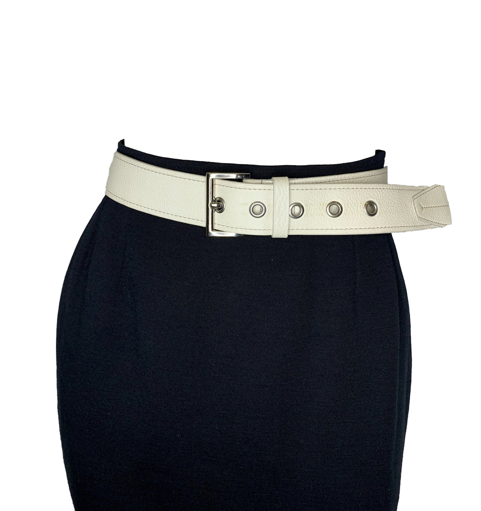White pebble leather belt with silver grommets and silver square buckle.