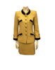 yellow, wool, two-piece jacket & skirt with black trim on four front pockets and on collar and cuffs. gold buttons down front.
