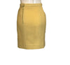 yellow, wool, two-piece jacket & skirt with black trim on four front pockets and on collar and cuffs. gold buttons down front.