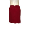 Full length back view of red Geoffrey Beene pencil skirt with zipper up the center. 