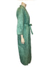 Side view of mannequin in a 1960s light turquoise quilted robe