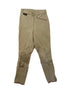 Khaki, stretchy breeches with a diagonal zip-pocket and distressed, leather knee-patches. 