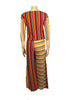 Asymmetrical, multicolor, striped, three-piece set. Three-quarter-sleeve shirt with vertical and diagonal stripes. Wide-leg pants with vertical and horizontal striped legs. 