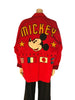 Red blazer reading "MICKEY INTERNATIONAL" with a large patch of Mickey Mouse's face