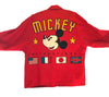 Red blazer reading "MICKEY INTERNATIONAL" with a large patch of Mickey Mouse's face