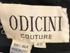Tag reading "ODICINI COUTURE 100% Silk"