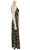 Black & white, zebra-print jumpsuit with spaghetti-straps, v-neck, and wide-legs. 