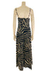 Black & white, zebra-print jumpsuit with spaghetti-straps, v-neck, and wide-legs. 