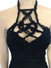 Closeup of woven halter neck on a black Dior dress