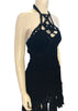 Diagonal front view of Dior woven black mini dress with a halter neck on a mannequin
