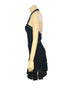 Side view of Dior woven black mini dress with a halter neck on a mannequin