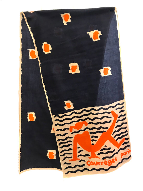 Courreges abstract oblong scarf with a woman lounging in front of waves, folded in half