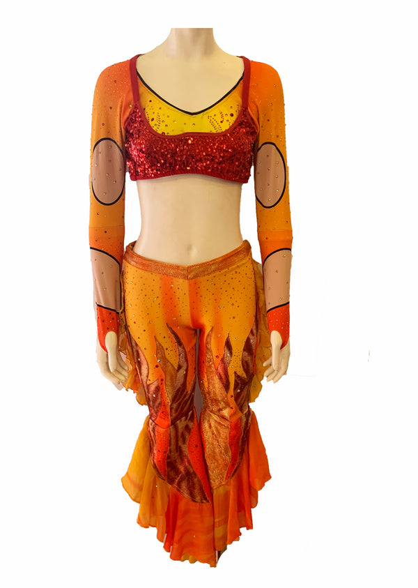 2 piece set featuring a long sleeve crop top and cropped stretch  dance pants with rhinestones, orange and yellow color block and flame detailing