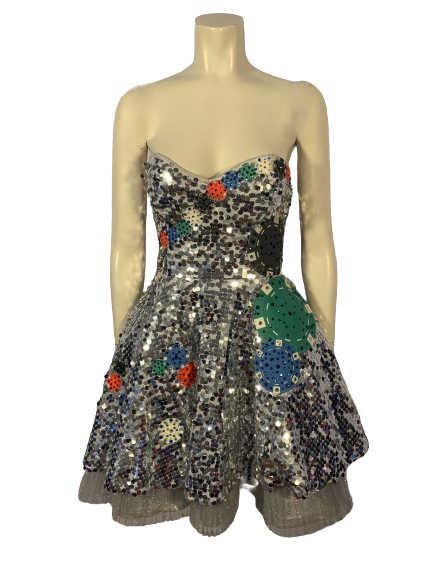 Silver paillette, fit & flare, sleeveless dress with blue, red, green, & white, round, rhinestone appliques. Silver, pleated underskirt. 