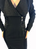 Black, long-sleeve, mini-dress with quilted panelling at the sides and collar. Asymmetrical front-zipper. 