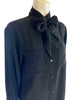 Long sleeve black silk blouse with bow at the neck