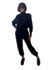Cotton, fleece-lined, purple, sweatshirt-jumpsuit with snap-front, elasticized-waist, and ribbed cuffs & ankles.