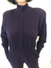 Cotton, fleece-lined, purple, sweatshirt-jumpsuit with snap-front, elasticized-waist, and ribbed cuffs & ankles.