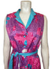 Magenta and purple psychedelic floral print maxi dress.