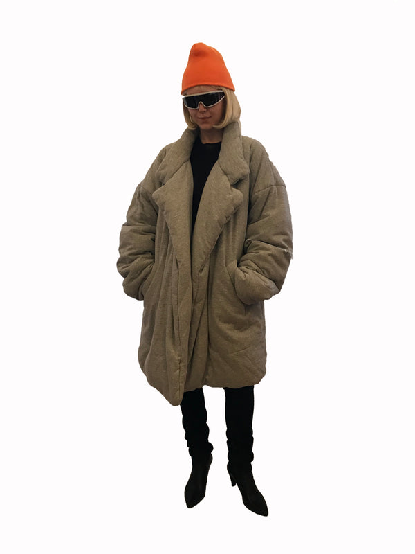 Grey, padded, oversized, sleeping-bag coat with oversized lapel. 