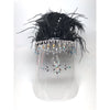 An embellished face shield with rhinestones and black feathers at the top