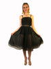 Two layer sheer black skirt with sequins sewn throughout. Satin waistband. Knee length.