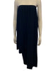Asymmetrical wool skirt with elasticized gathered waist. and cutout details on either side. Can be worn as a strapless dress if pulled up over bust.