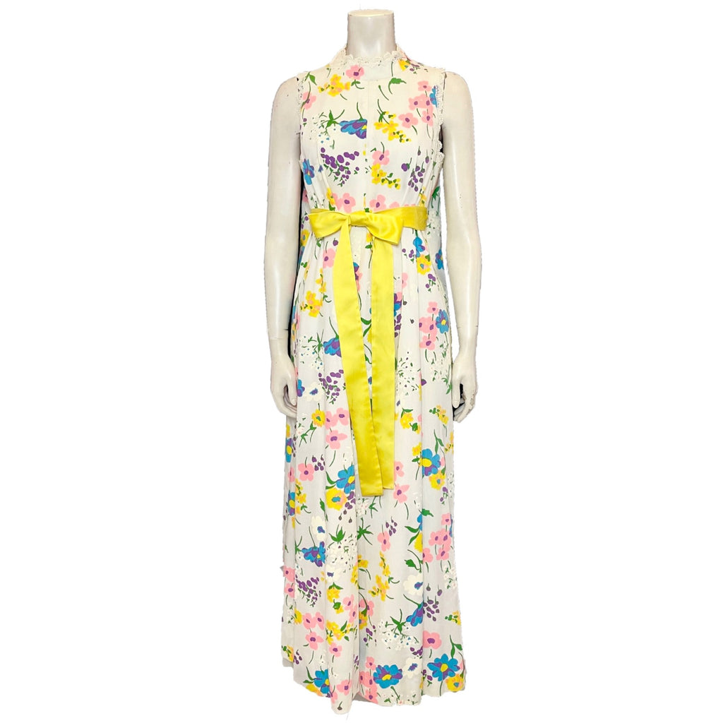 White and multicolor floral maxi dress with yellow belt. 