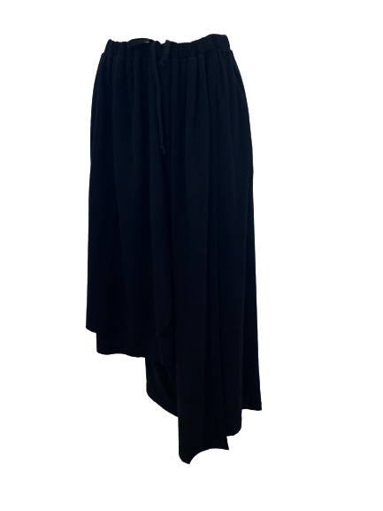 Asymmetrical wool skirt with elasticized  gathered waist. and cutout details on either side. Can be worn as a strapless dress if pulled up over bust. 