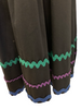 Red & black, two-tier, long-skirt with green, purple, and blue ric-rac. 