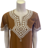 Closeup front view of a mannequin in a brown short sleeve kaftan with white embroidery