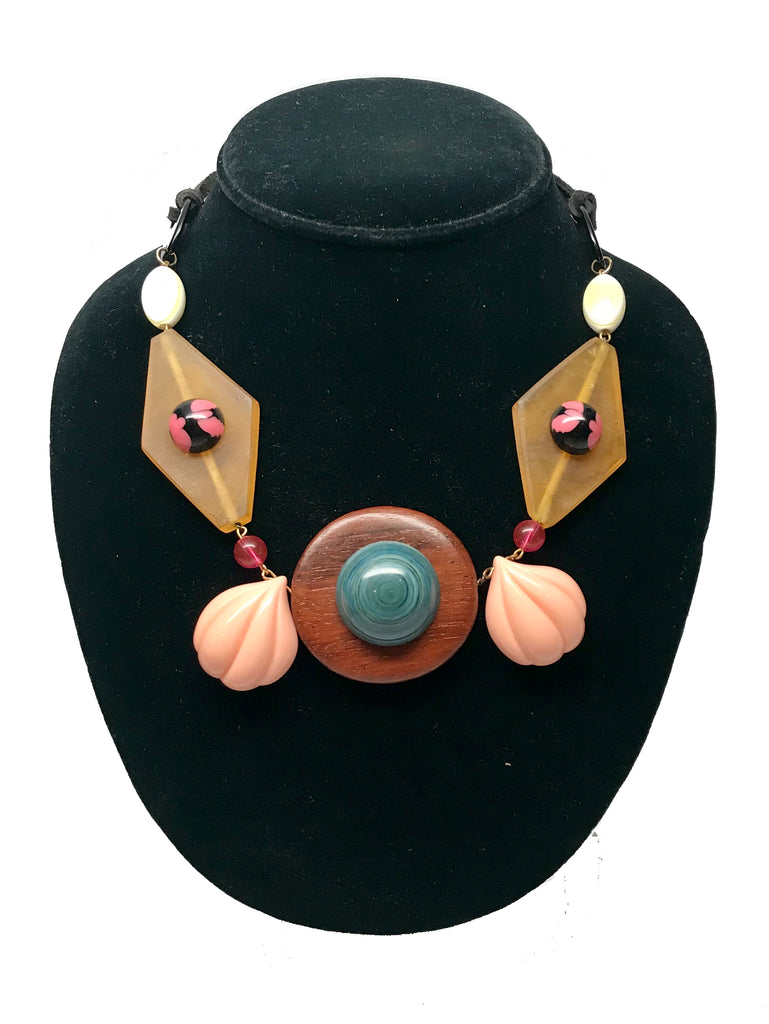 Single strand multimedia necklace with resin and wood beads