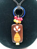 Multimedia pendant necklace with resin and wood beads