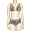 blue, pink, and green floral print bikini on a mannequin form