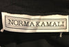 Norma Kamali tag.