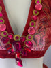 Red, tie-dye, velvet, bejewelled, two-piece set. Consists of bell-bottom pants and halter bra-top. 