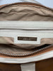 Engraved Bottega Veneta tag. 